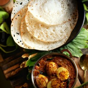 cd1a4fcf454a19fa695511d37fc573f7-3.jpg APPAM MUTTA CURRY